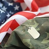 US Flag on camouflage uniform and dog tag